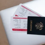 Close-up of a passport and boarding pass ready for international travel