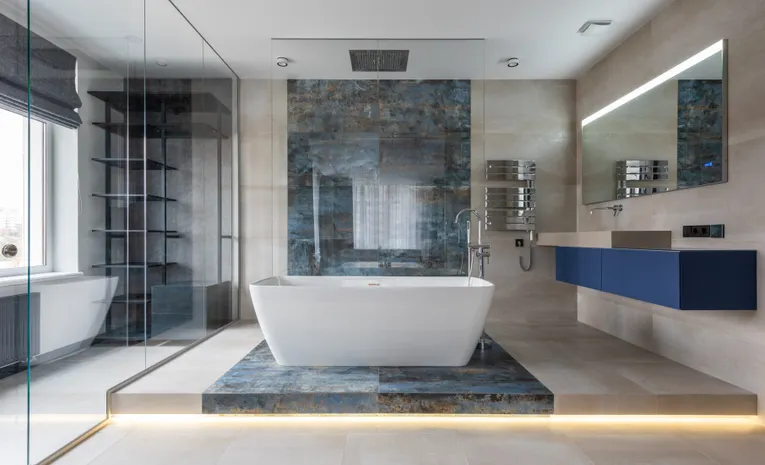 Modern hotel bathroom with a private freestanding jacuzzi tub